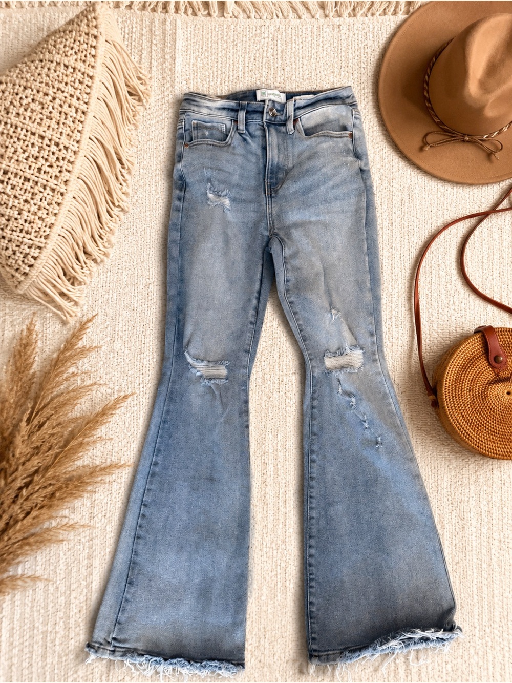 Distressed Light Blue Flare Jeans - Women